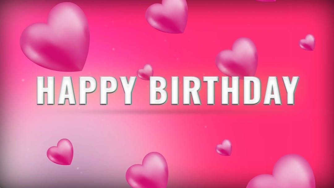 Happy birthday text with a floating hearts effect